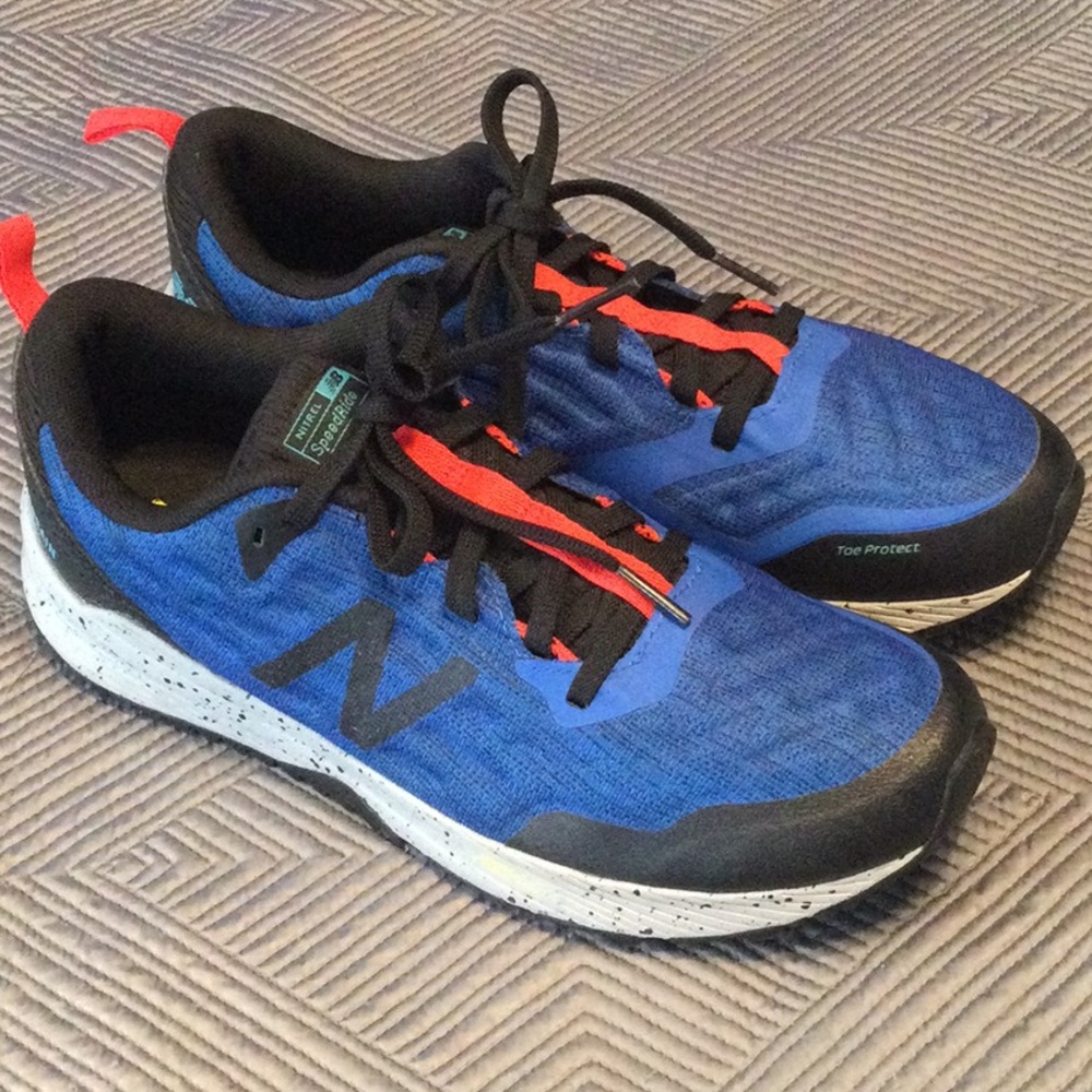 New Balance size 6 black and blue sneakers for men